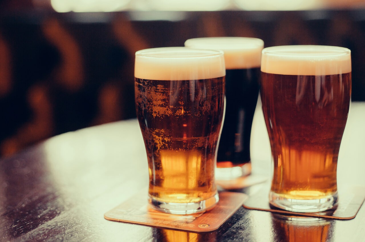 draft beers on a bar top