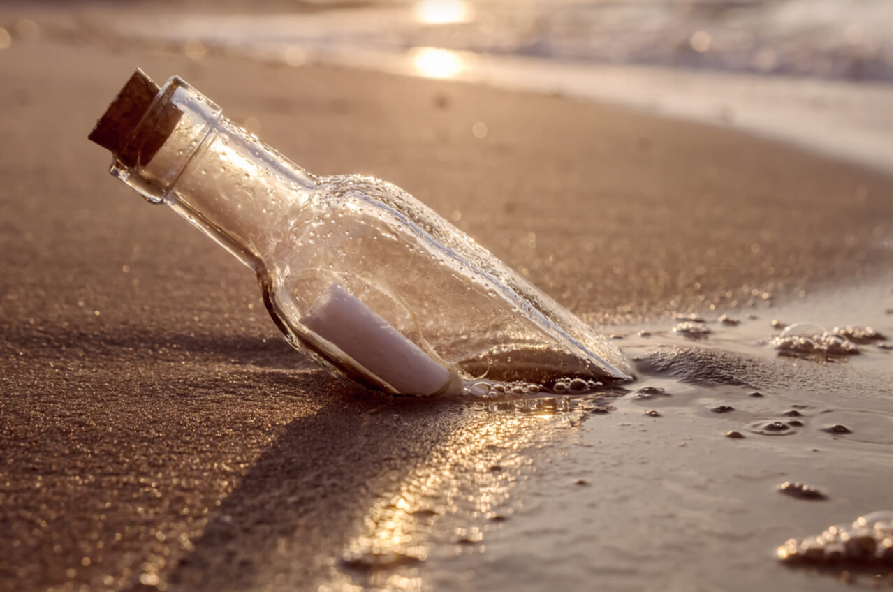 message in a bottle on the beach