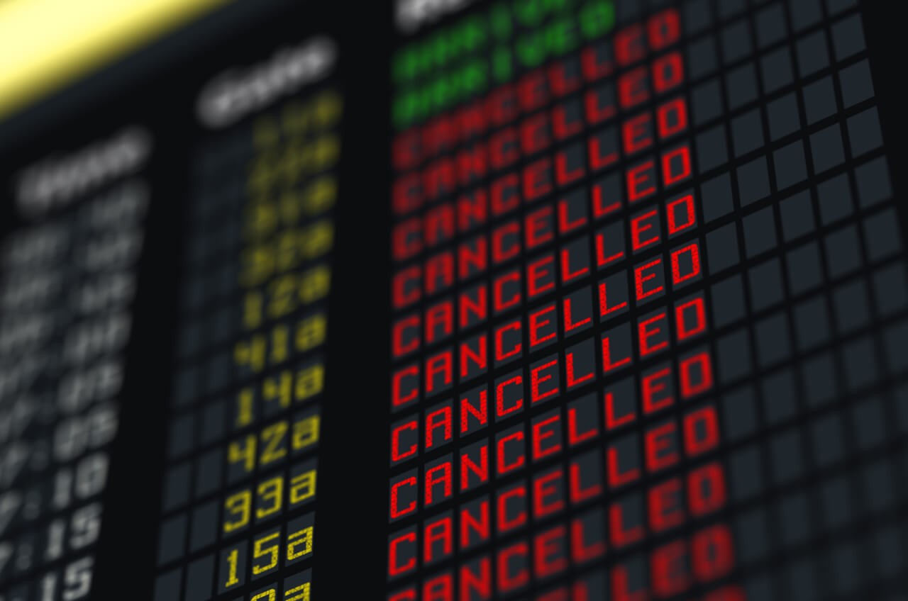 cancelled flights on airport board