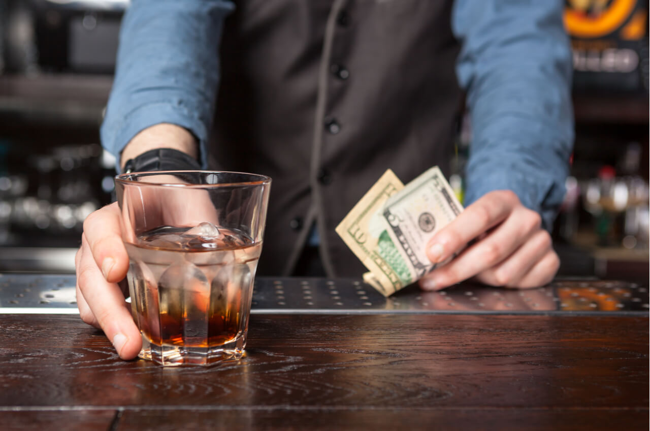 alcohol shot and cash